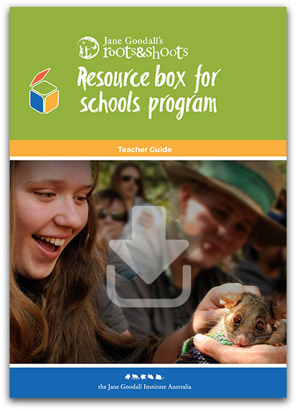 Jane Goodall's Resource box schools program a young girl holding a possum and smiling